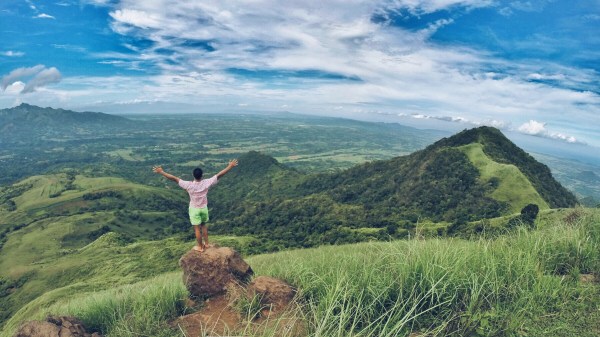 Standing on one of the world's boobs
