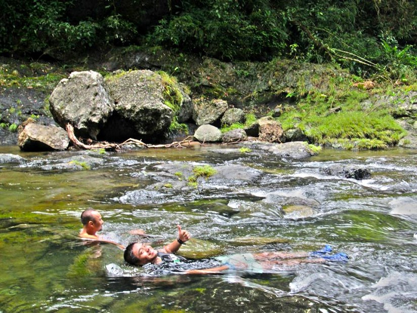 Relaxing in the VERY cool river water