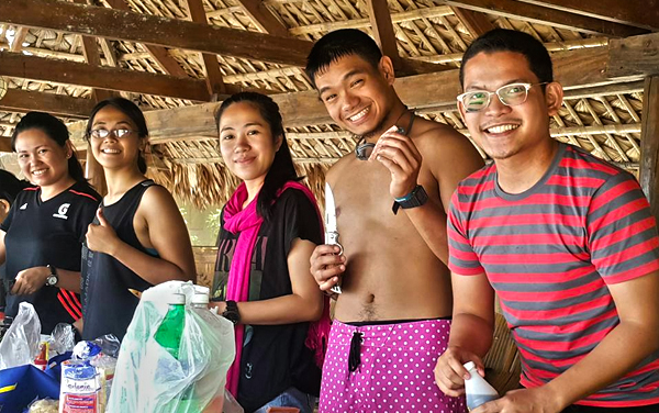 Our group cooking up the most delicious beach breakfast ever