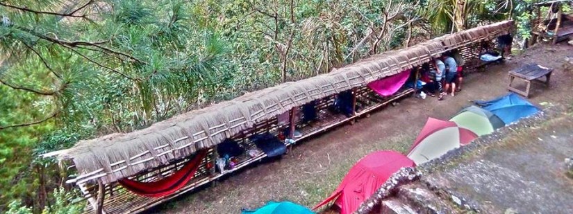 Setting up our hammocks and tents at the foot of the shrine
